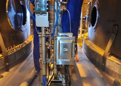 Siemens pump skid controls and sensors mounted between product tanks at the Elizabeth Seaport tank farm